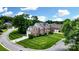 Beautiful red brick home with manicured lawn and mature trees in a desirable neighborhood at 4312 Beech Wood Ct # 140, Belmont, NC 28012