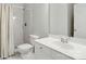 Clean, well-lit bathroom featuring a walk-in shower with marble tiling, and white vanity at 4312 Beech Wood Ct, Belmont, NC 28012