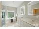 Beautiful bathroom with a standalone tub, double sink vanity, and modern fixtures at 4312 Beech Wood Ct, Belmont, NC 28012
