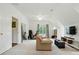 Large bonus room with entertainment area, exercise equipment and an abundance of natural light at 4312 Beech Wood Ct, Belmont, NC 28012