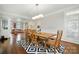 Elegant dining room featuring a stylish rug and hardwood flooring at 4312 Beech Wood Ct, Belmont, NC 28012
