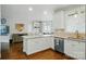 Bright kitchen with granite countertops, a central island and stainless steel appliances at 4312 Beech Wood Ct, Belmont, NC 28012