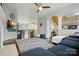 Open-concept living room flows into the kitchen with hardwood floors and ceiling fan at 4312 Beech Wood Ct, Belmont, NC 28012
