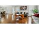 Open-concept living room with hardwood floors and comfortable seating arrangement at 4312 Beech Wood Ct, Belmont, NC 28012