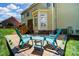 Backyard patio with outdoor seating, perfect for enjoying the serene surroundings at 4312 Beech Wood Ct, Belmont, NC 28012
