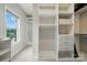 Organized walk-in closet with shelving units and ample storage space at 4312 Beech Wood Ct, Belmont, NC 28012