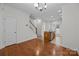 Kitchen area with hardwood floors and access to the upper floor at 435 Hurston Cir, Charlotte, NC 28208