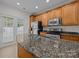 Well-equipped kitchen with granite countertops and stainless steel appliances at 435 Hurston Cir, Charlotte, NC 28208