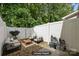 Virtually staged patio area, features a relaxing seating area perfect for outdoor entertaining at 435 Hurston Cir, Charlotte, NC 28208