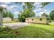 Exterior view of home and backyard with storage building and a well-manicured lawn at 4720 Randleman Rd, Conover, NC 28613