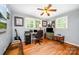 Inviting bedroom with natural light, hardwood floors, and comfortable decor, a relaxing personal space at 4720 Randleman Rd, Conover, NC 28613