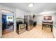 Bright kitchen with stainless appliances, tile flooring, and adjacent dining area, perfect for Gathering meals at 4720 Randleman Rd, Conover, NC 28613