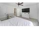 Spacious bedroom with a ceiling fan, closet, and room for a crib or bed at 502 Heritage Pkwy, Fort Mill, SC 29715