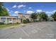 Townhome with well-maintained landscaping and convenient parking spaces at 502 Heritage Pkwy, Fort Mill, SC 29715
