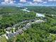 A neighborhood with scenic lakeside views and mature trees at 510 Placid Ct, Tega Cay, SC 29708