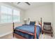 Inviting bedroom with plantation shutters, cozy bedding, and classic decor for a comfortable retreat at 5129 Whitman Ave, Matthews, NC 28105