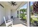 Charming front porch with rocking chairs and a view of the landscaped yard at 5129 Whitman Ave, Matthews, NC 28105