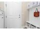 Functional mudroom featuring built-in storage cubbies and bench, perfect for organization at 5129 Whitman Ave, Matthews, NC 28105