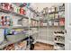 Walk-in pantry with abundant shelving providing ample storage space at 5129 Whitman Ave, Matthews, NC 28105