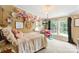 This bedroom is decorated with paper flowers and features two large windows at 5425 Creek Run Ct, Kings Mountain, NC 28086