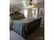 Comfortable bedroom with ornate wooden sleigh bed and natural lighting at 5425 Creek Run Ct, Kings Mountain, NC 28086
