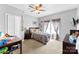The bedroom has a ceiling fan, carpeting, and a large closet at 5425 Creek Run Ct, Kings Mountain, NC 28086