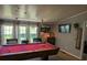 Recreation room features a billiards table and natural light at 5425 Creek Run Ct, Kings Mountain, NC 28086
