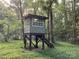 Elevated hunting stand nestled among the trees, offering an immersive outdoor experience at 5425 Creek Run Ct, Kings Mountain, NC 28086