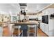Spacious kitchen with a central island, breakfast bar, and a seamless flow to the adjacent dining area and living spaces at 5425 Creek Run Ct, Kings Mountain, NC 28086