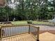 New backyard deck overlooks lush backyard and offers space for entertaining at 5916 Indian Brook Dr, Matthews, NC 28104