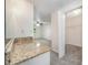 Bedroom featuring granite counter, neutral carpet, fan, and closet for ample storage at 7008 Wannamaker Ln, Charlotte, NC 28226