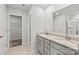 Double sink bathroom with tile floor, granite countertop and walk-in shower at 707 Olde England Dr, Lincolnton, NC 28092