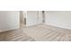 Bedroom with neutral carpet, bright walls and doorway into ensuite bathroom at 707 Olde England Dr, Lincolnton, NC 28092