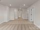 Spacious basement with neutral carpeting, recessed lighting, and multiple doorways leading to other areas of the home at 7311 Jerimoth Dr, Charlotte, NC 28215