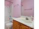 Bathroom featuring a vanity and shower with pink walls at 8002 Kingston Dr, Waxhaw, NC 28173