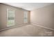 Bright bedroom featuring natural light and neutral walls at 8002 Kingston Dr, Waxhaw, NC 28173