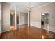 Spacious living room featuring hardwood floors and neutral wall paint at 8002 Kingston Dr, Waxhaw, NC 28173