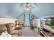 Cozy bedroom with vaulted ceilings, sofa and television at 8904 Gerald Dr, Charlotte, NC 28217