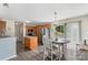 Kitchen with wood cabinets, stainless steel appliances and an adjacent eating area at 8904 Gerald Dr, Charlotte, NC 28217