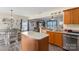 Kitchen overlooking living area with ample countertop space and natural light at 8904 Gerald Dr, Charlotte, NC 28217