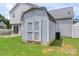 Image of tool shed near house shows practical storage space for yard equipment at 8904 Gerald Dr, Charlotte, NC 28217