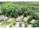 Aerial view of a residential neighborhood with tree coverage at 9716 Psalms St, Cornelius, NC 28031