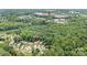 Aerial view of a neighborhood with a shopping center nearby at 9716 Psalms St, Cornelius, NC 28031