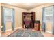 Cozy home office with built-in desk, chair, and printer at 9716 Psalms St, Cornelius, NC 28031