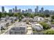 Aerial view of a modern residential neighborhood with skyline views in a dynamic urban community at 1011 Westbrook Dr # A, Charlotte, NC 28202