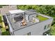 Rooftop deck featuring a pergola, fire pit, comfortable chairs, and a stylish outdoor retreat at 1011 Westbrook Dr # A, Charlotte, NC 28202