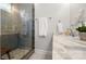 Bathroom featuring glass shower and marble vanity with elegant design at 1011 Westbrook Dr # A, Charlotte, NC 28202