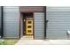Modern home exterior with a pop of color from the yellow front door at 1011 Westbrook Dr # A, Charlotte, NC 28202