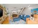 Spacious open living area with stylish decor, hardwood floors, and staircase at 1011 Westbrook Dr # A, Charlotte, NC 28202