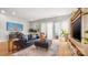 Bright living room boasts hardwood floors, modern furnishings, and a cozy atmosphere at 1011 Westbrook Dr # A, Charlotte, NC 28202